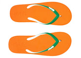Orange flip-flops with green straps on a white background