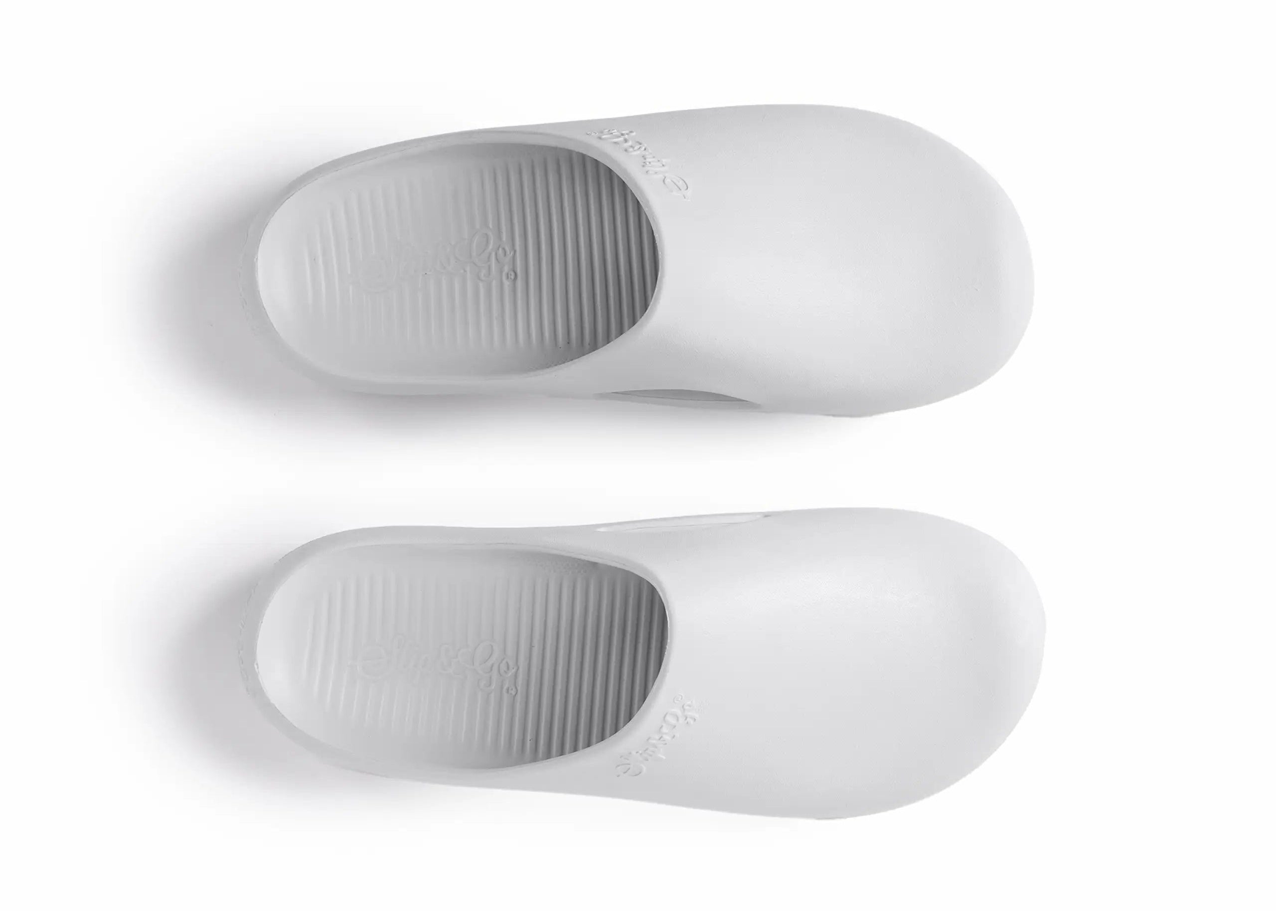 Pair of white slippers on a white background
