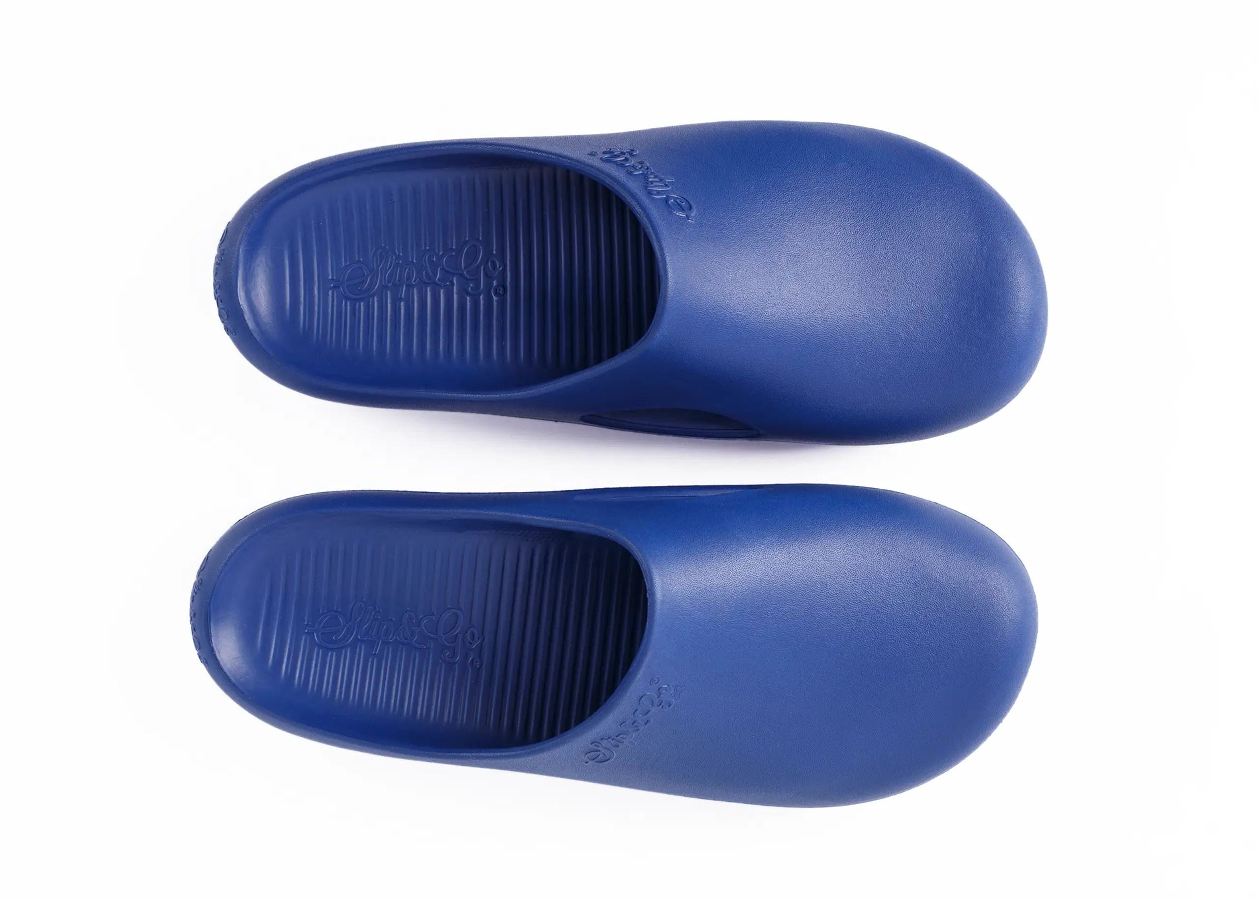 Pair of blue slippers on a white background