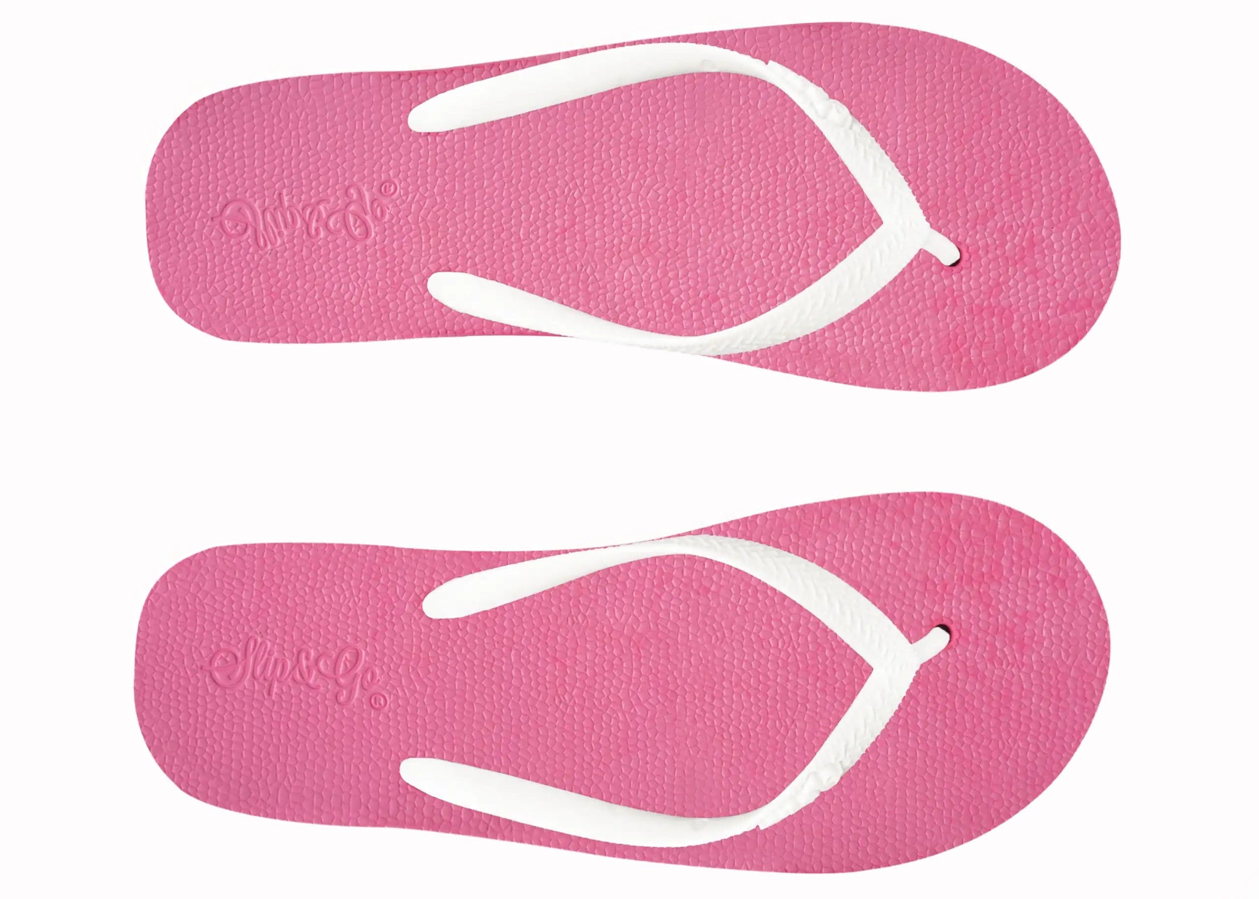 Two pink flip-flops with white straps on a white background