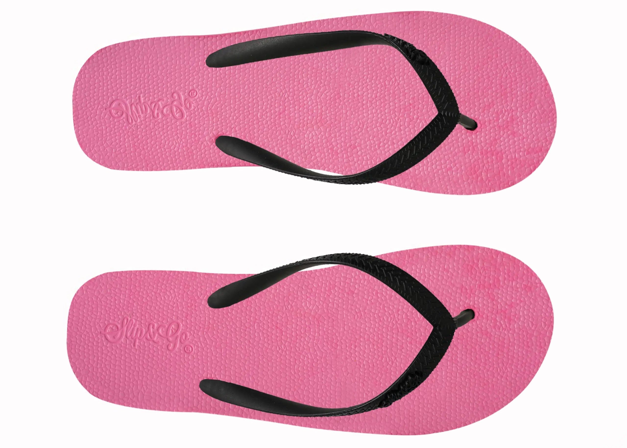 Pink flip-flops with black straps on a white background