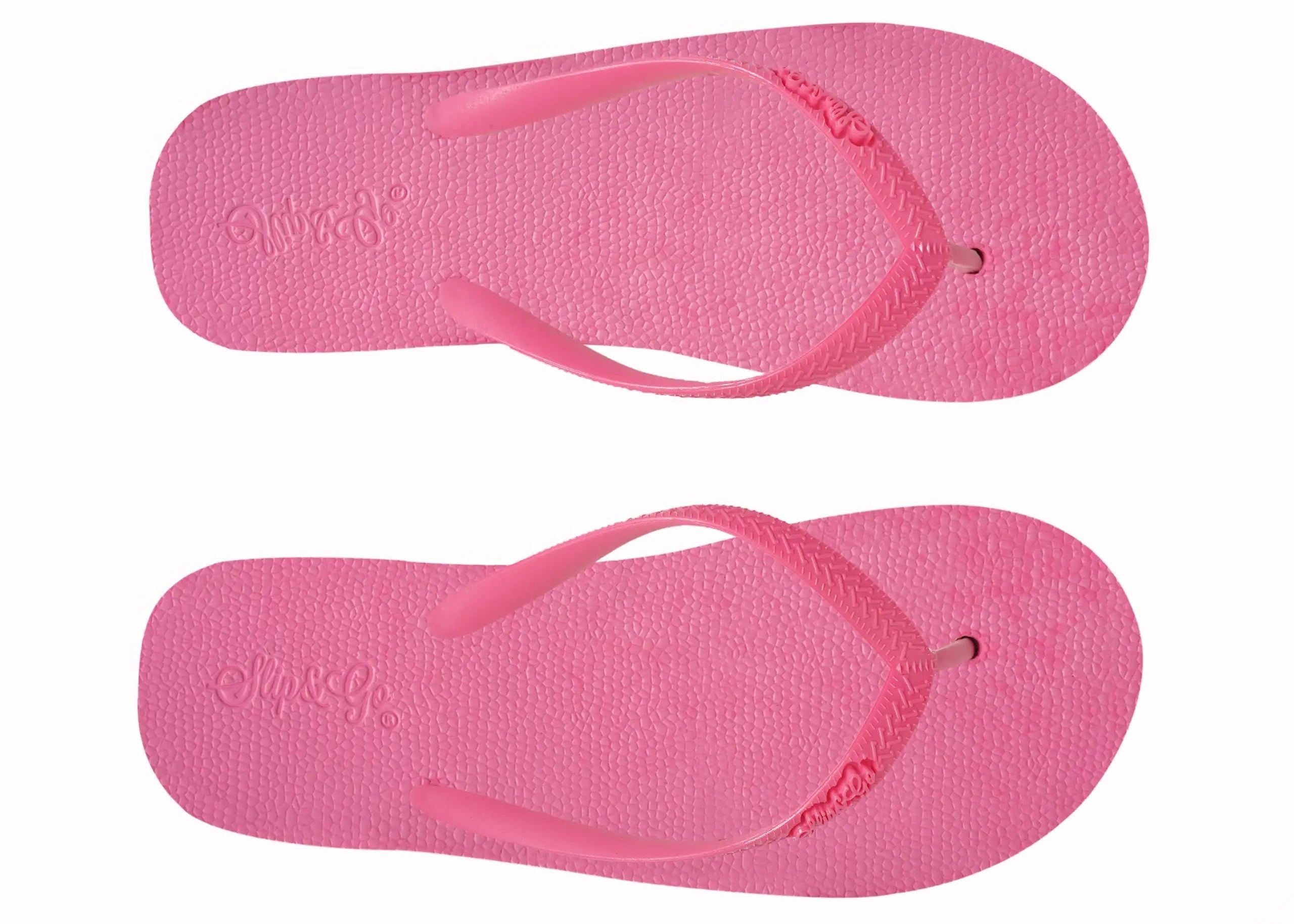 Pair of pink flip-flops on a white background