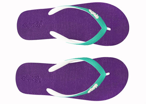 Purple flip-flops with green and white straps on a white background