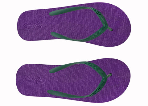 Purple flip-flops with green straps on a white background