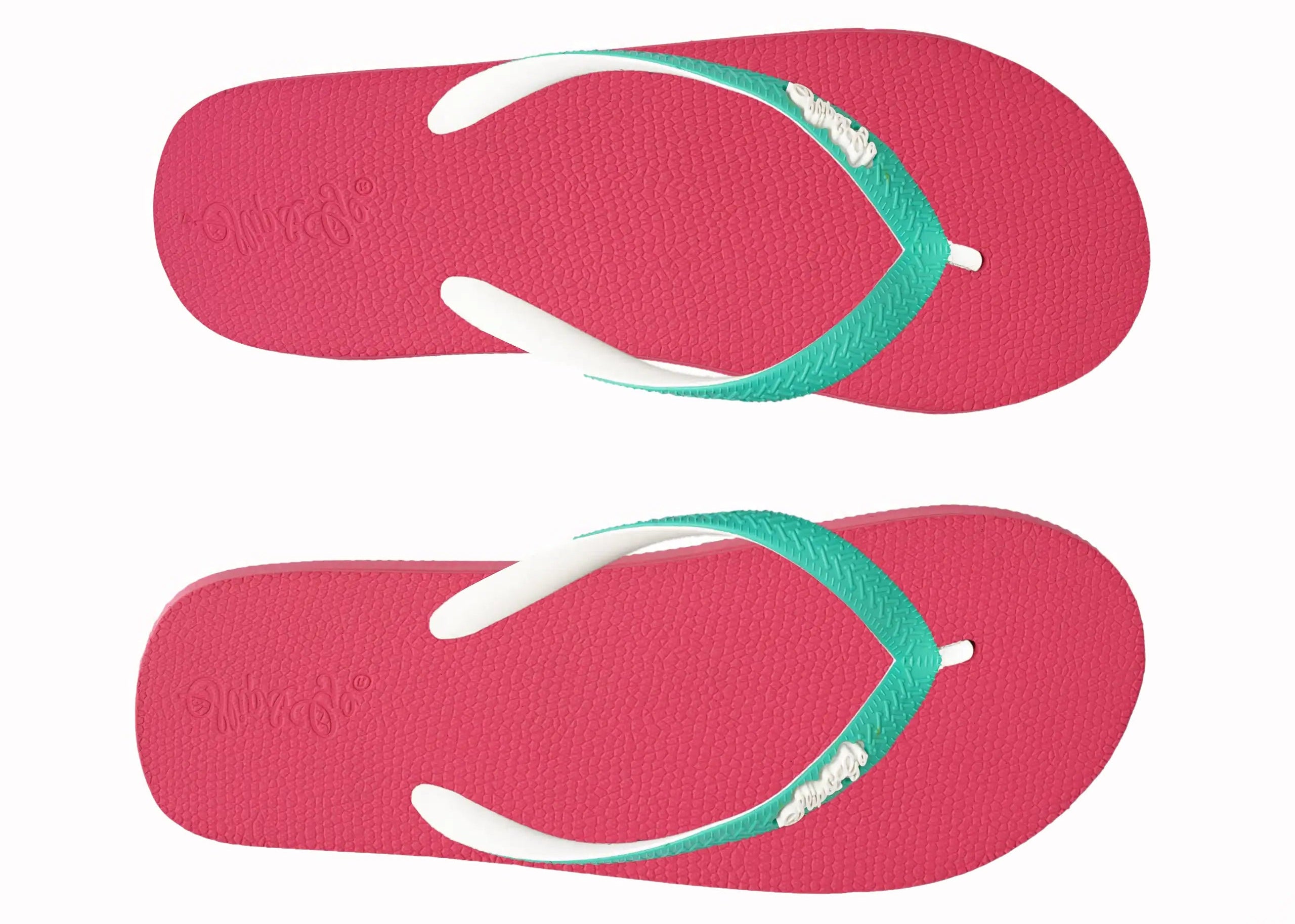 Pair of pink flip-flops with green straps on a white background