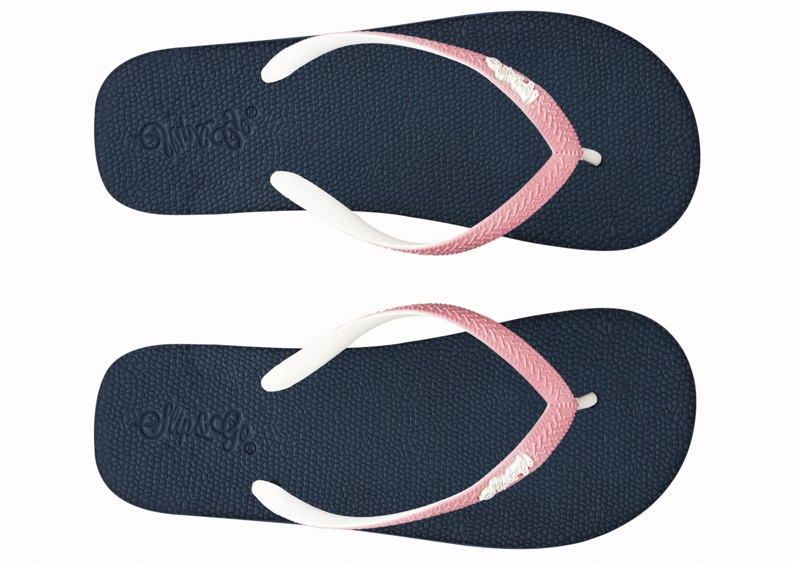 Pair of navy blue flip-flops with pink and white straps on a white background