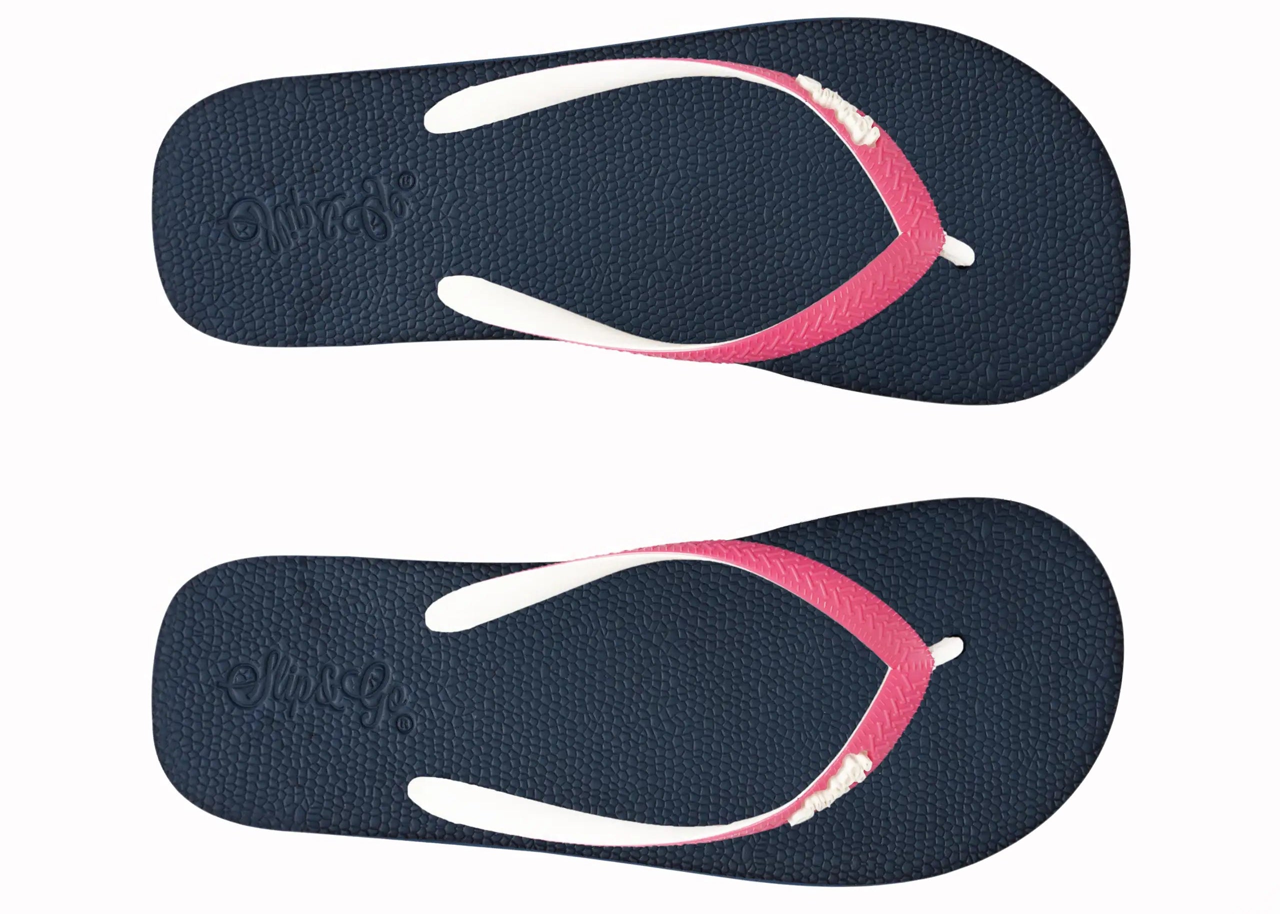 Pair of navy blue flip-flops with pink straps on a white background