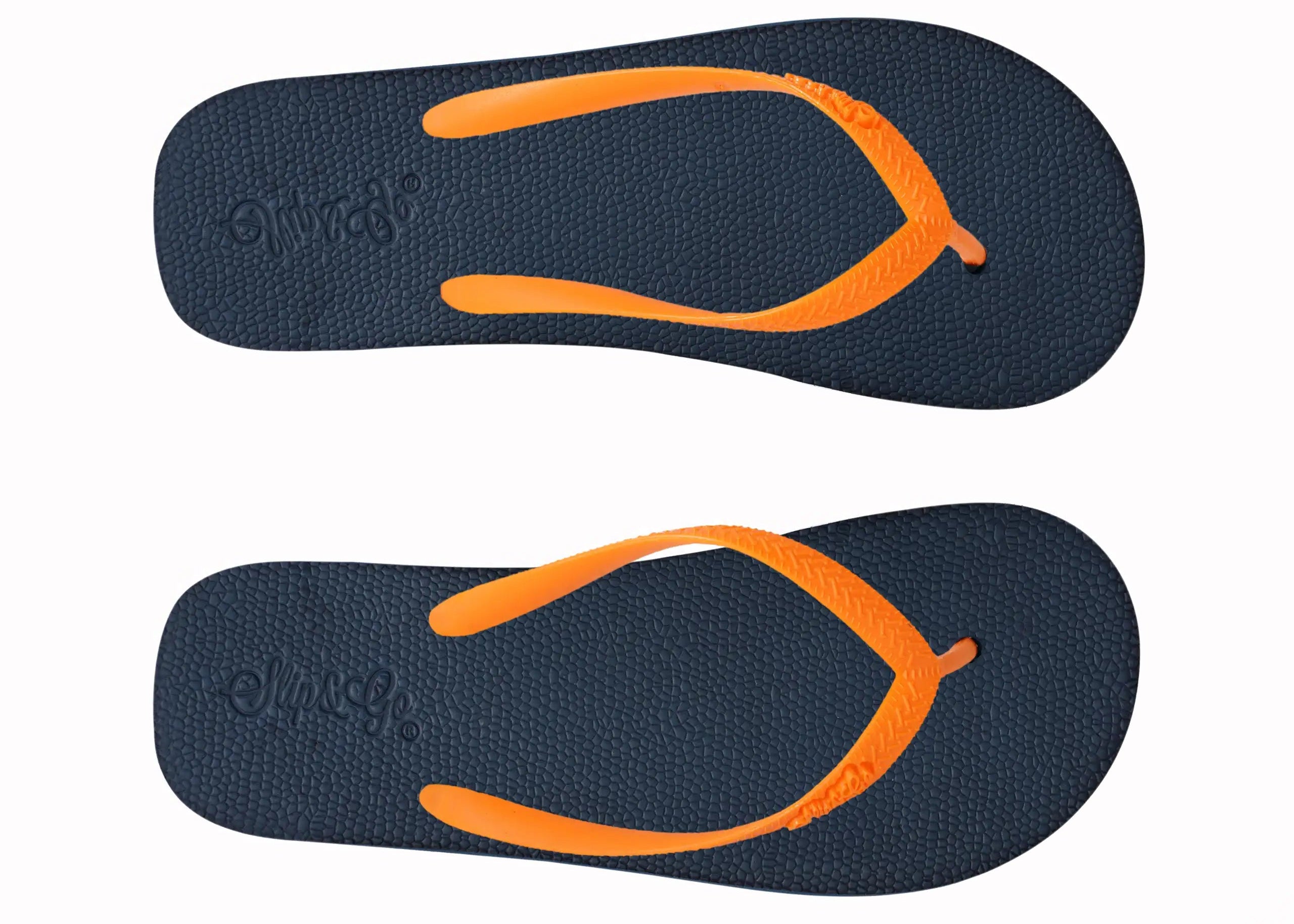 Pair of navy blue flip-flops with orange straps on a white background