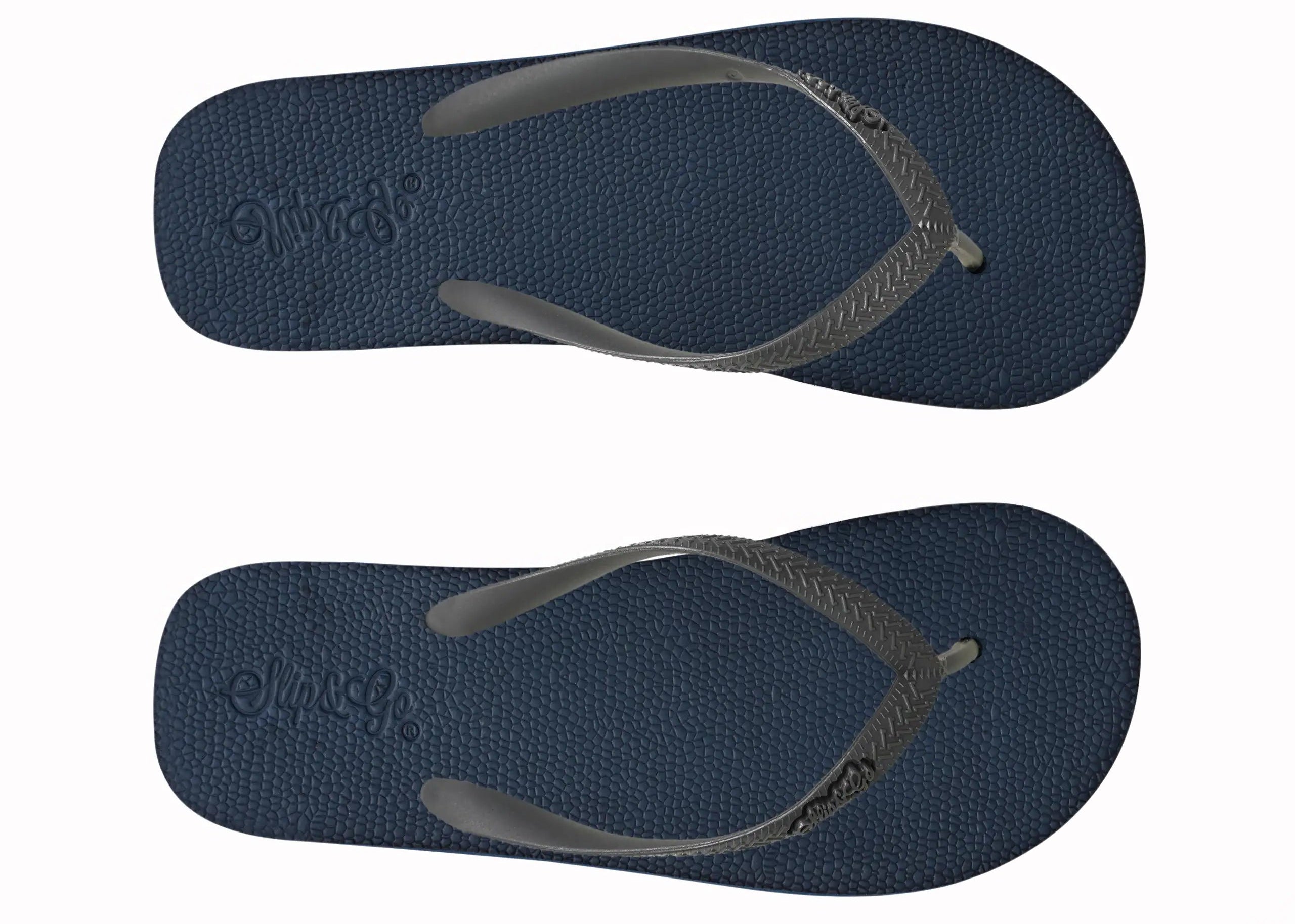 Pair of navy blue flip-flops with gray straps on a white background