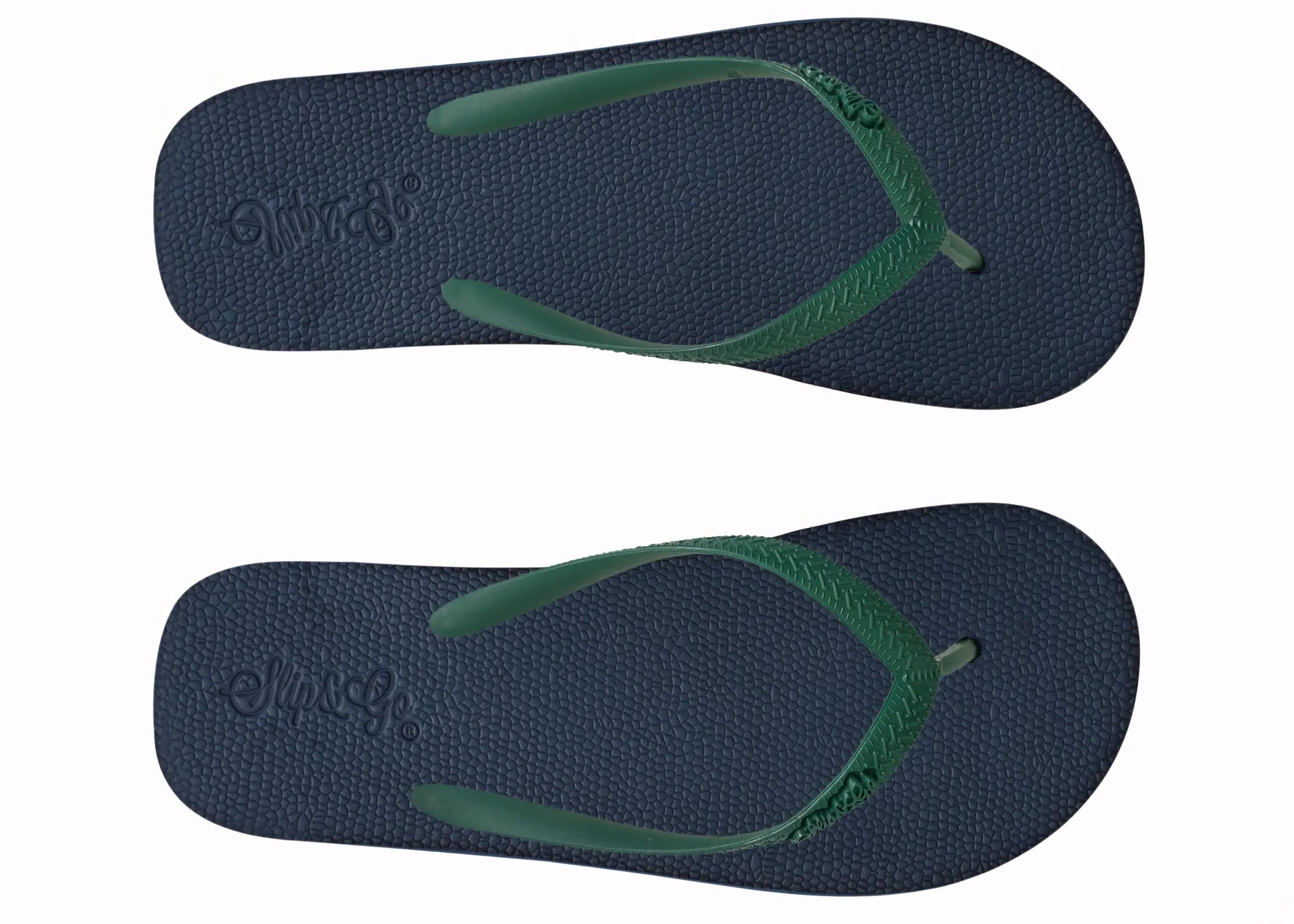 Pair of navy blue and green flip-flops on a white background