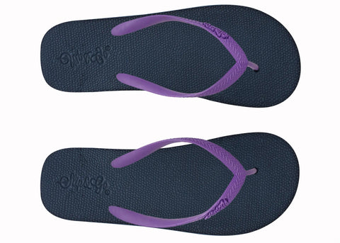 Pair of navy blue flip-flops with purple straps on a white background