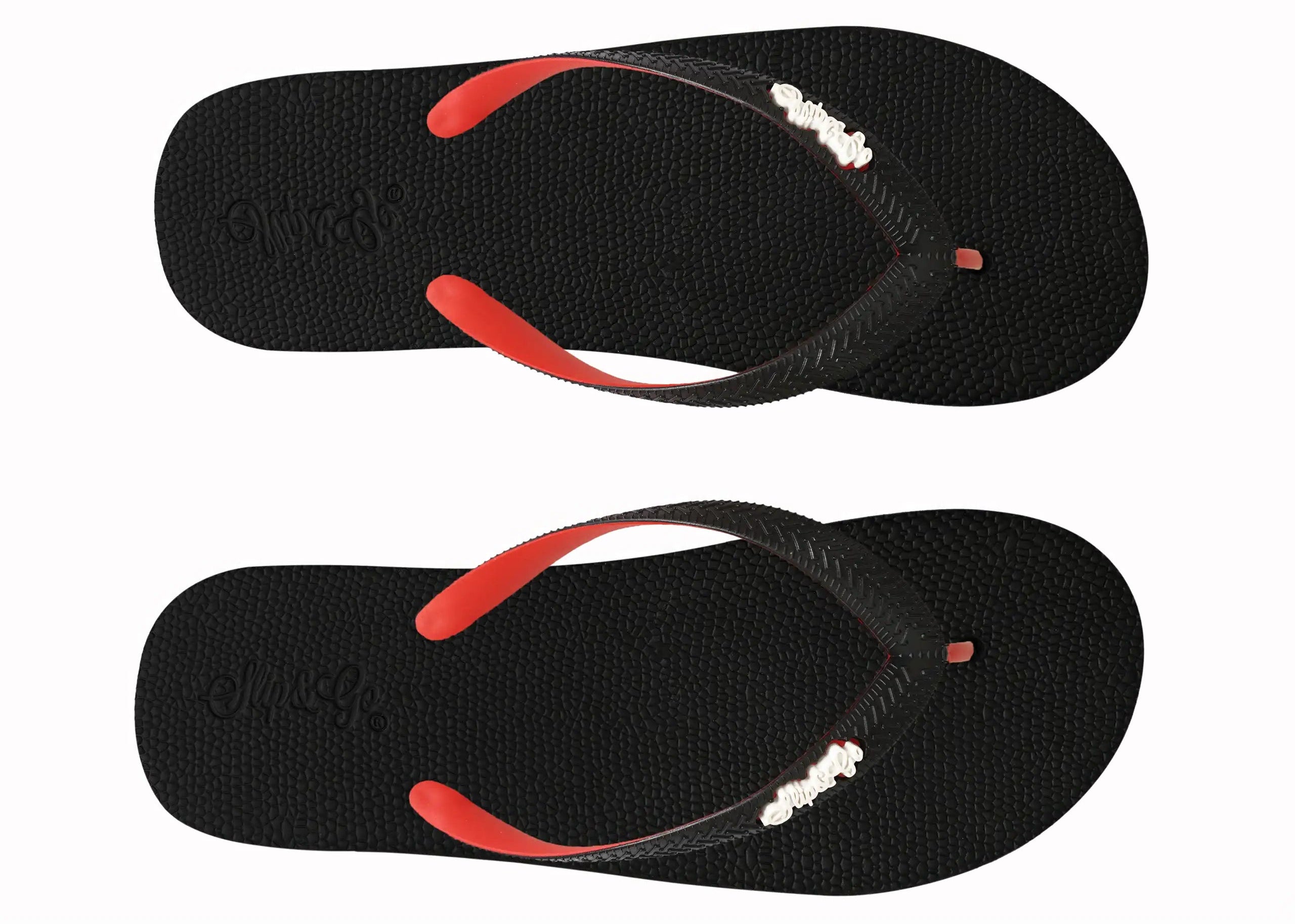 Black flip-flops with red soles and white logo on a white background