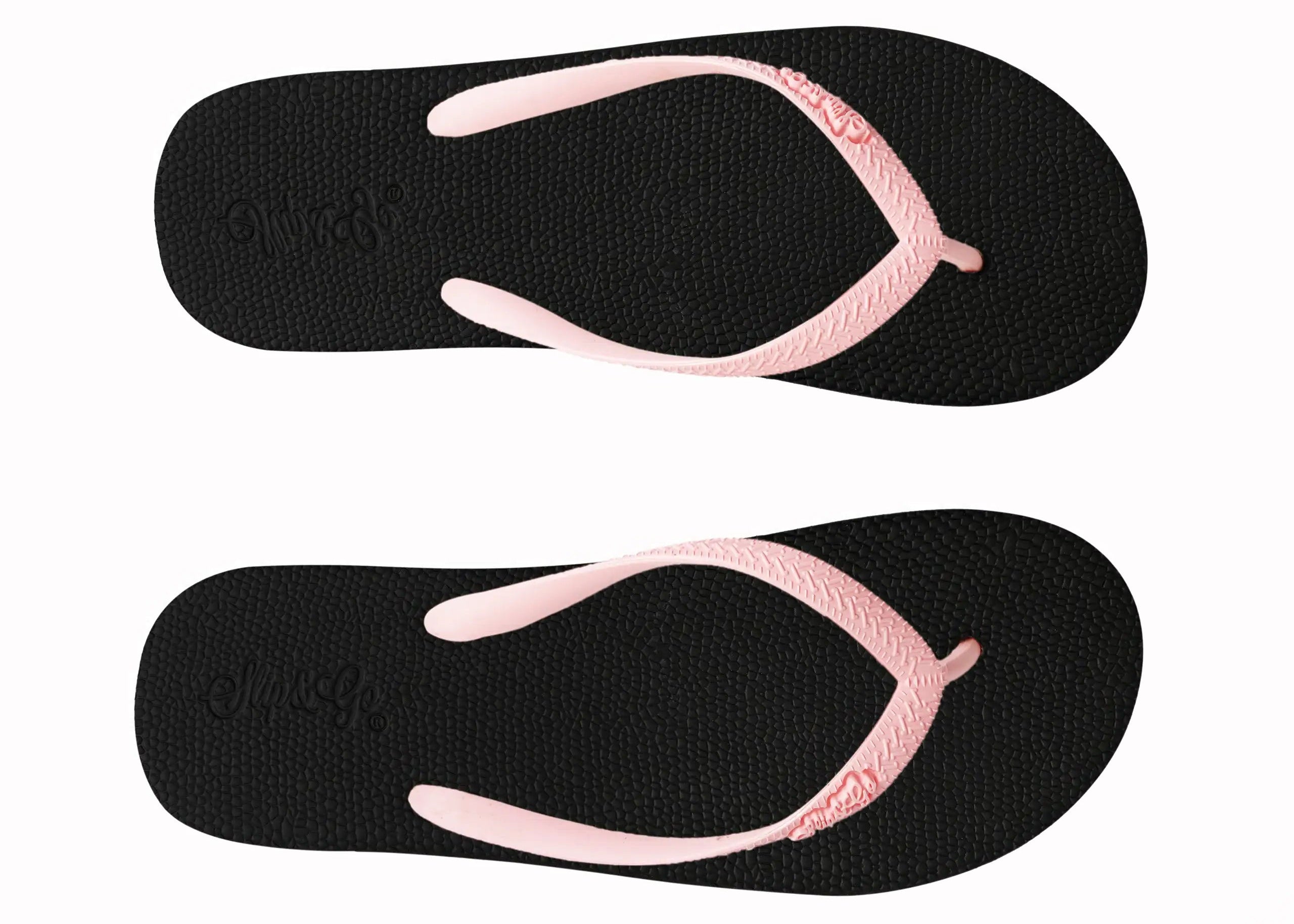 Black flip-flops with pink straps on a white background