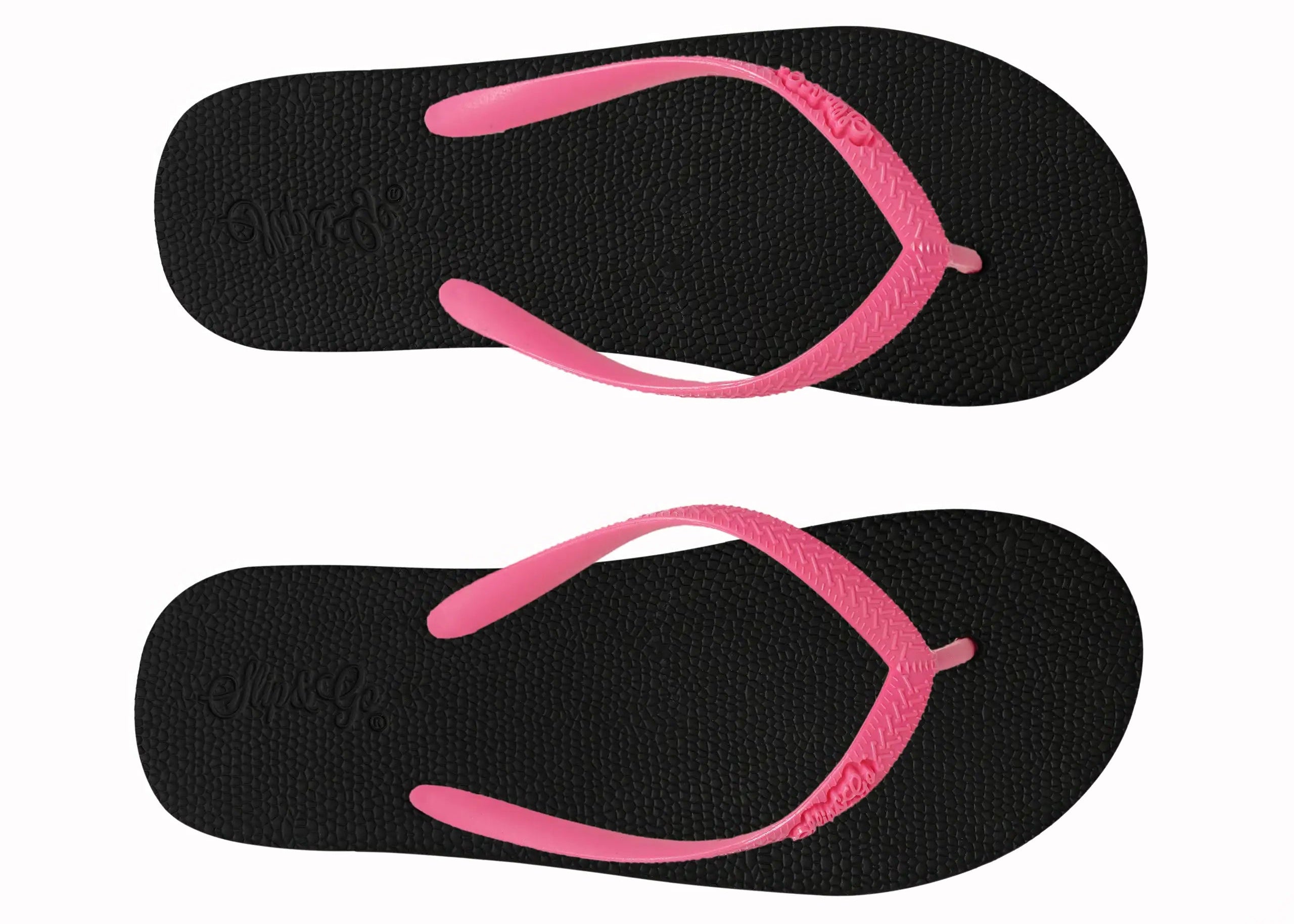 Black flip-flops with pink straps on a white background